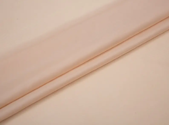 An féidir le fabraic líneáil vioscós poileistir cobhsaíocht éadaí a choinneáil i dtimpeallachtaí te agus tais?